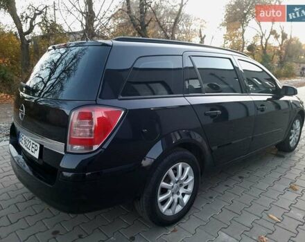 Черный Опель Астра, объемом двигателя 1.6 л и пробегом 327 тыс. км за 4400 $, фото 6 на Automoto.ua