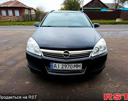 Черный Опель Астра, объемом двигателя 1.7 л и пробегом 300 тыс. км за 5250 $, фото 1 на Automoto.ua