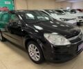 Черный Опель Астра, объемом двигателя 1.4 л и пробегом 210 тыс. км за 5600 $, фото 1 на Automoto.ua