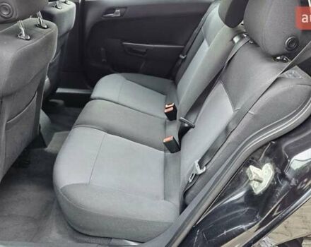 Черный Опель Астра, объемом двигателя 1.6 л и пробегом 209 тыс. км за 5850 $, фото 36 на Automoto.ua