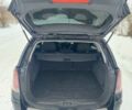 Черный Опель Астра, объемом двигателя 1.7 л и пробегом 245 тыс. км за 5800 $, фото 12 на Automoto.ua