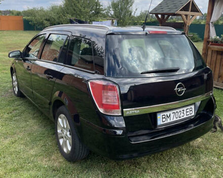 Чорний Опель Астра, об'ємом двигуна 1.8 л та пробігом 204 тис. км за 5400 $, фото 7 на Automoto.ua