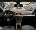 Черный Опель Астра, объемом двигателя 1.4 л и пробегом 210 тыс. км за 5600 $, фото 10 на Automoto.ua