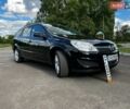 Черный Опель Астра, объемом двигателя 1.6 л и пробегом 240 тыс. км за 5700 $, фото 1 на Automoto.ua