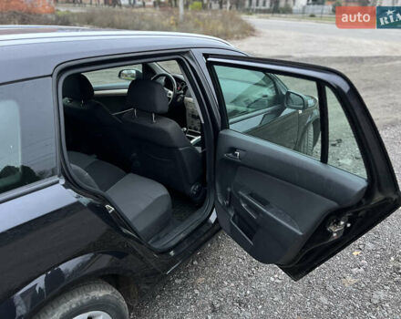 Черный Опель Астра, объемом двигателя 1.8 л и пробегом 209 тыс. км за 5600 $, фото 24 на Automoto.ua