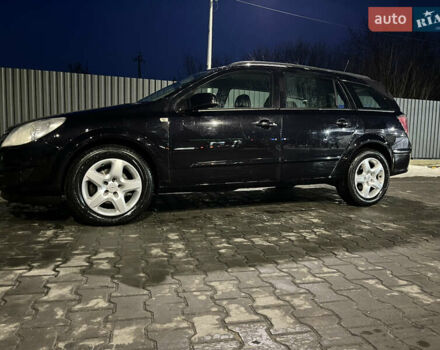 Черный Опель Астра, объемом двигателя 1.69 л и пробегом 270 тыс. км за 5500 $, фото 17 на Automoto.ua