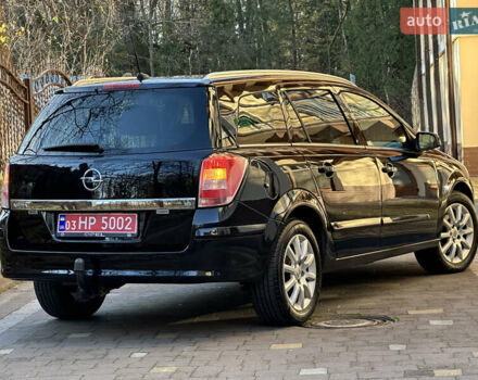 Черный Опель Астра, объемом двигателя 1.6 л и пробегом 180 тыс. км за 5499 $, фото 84 на Automoto.ua