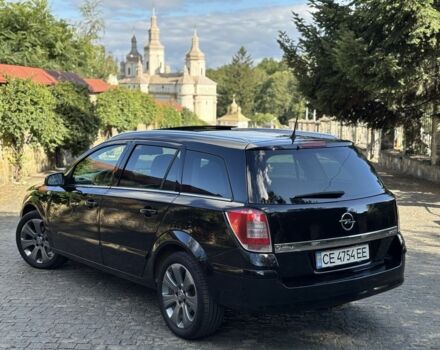 Черный Опель Астра, объемом двигателя 1.7 л и пробегом 280 тыс. км за 5600 $, фото 13 на Automoto.ua