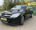 Черный Опель Астра, объемом двигателя 1.6 л и пробегом 223 тыс. км за 5950 $, фото 1 на Automoto.ua