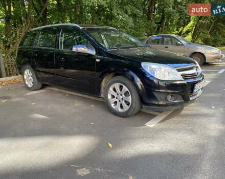 Черный Опель Астра, объемом двигателя 1.8 л и пробегом 145 тыс. км за 5900 $, фото 2 на Automoto.ua