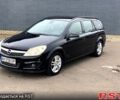 Черный Опель Астра, объемом двигателя 1.6 л и пробегом 243 тыс. км за 4699 $, фото 1 на Automoto.ua