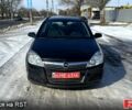 Черный Опель Астра, объемом двигателя 1.6 л и пробегом 230 тыс. км за 5800 $, фото 1 на Automoto.ua