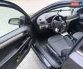 Черный Опель Астра, объемом двигателя 1.6 л и пробегом 250 тыс. км за 5200 $, фото 3 на Automoto.ua