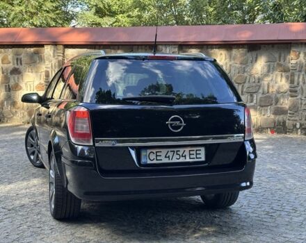Черный Опель Астра, объемом двигателя 1.7 л и пробегом 280 тыс. км за 5600 $, фото 11 на Automoto.ua