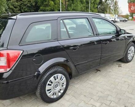 Черный Опель Астра, объемом двигателя 1.6 л и пробегом 209 тыс. км за 5850 $, фото 29 на Automoto.ua