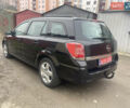 Черный Опель Астра, объемом двигателя 1.6 л и пробегом 206 тыс. км за 4900 $, фото 7 на Automoto.ua