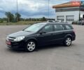 Черный Опель Астра, объемом двигателя 1.6 л и пробегом 239 тыс. км за 4300 $, фото 1 на Automoto.ua
