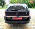 Черный Опель Астра, объемом двигателя 1.6 л и пробегом 190 тыс. км за 4999 $, фото 18 на Automoto.ua