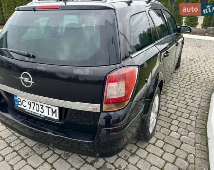 Черный Опель Астра, объемом двигателя 1.69 л и пробегом 313 тыс. км за 5100 $, фото 2 на Automoto.ua