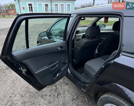 Черный Опель Астра, объемом двигателя 1.8 л и пробегом 209 тыс. км за 5600 $, фото 34 на Automoto.ua