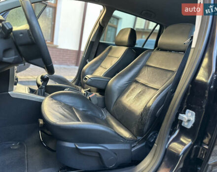 Черный Опель Астра, объемом двигателя 1.6 л и пробегом 180 тыс. км за 5499 $, фото 142 на Automoto.ua