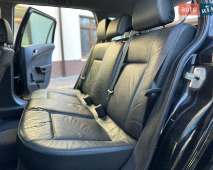 Черный Опель Астра, объемом двигателя 1.6 л и пробегом 180 тыс. км за 5499 $, фото 174 на Automoto.ua