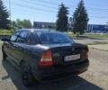 Черный Опель Астра, объемом двигателя 1.6 л и пробегом 235 тыс. км за 3500 $, фото 1 на Automoto.ua