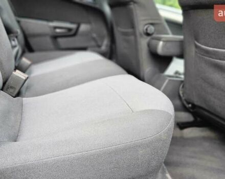 Черный Опель Астра, объемом двигателя 1.6 л и пробегом 209 тыс. км за 5850 $, фото 33 на Automoto.ua