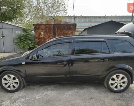 Черный Опель Астра, объемом двигателя 1.6 л и пробегом 267 тыс. км за 5500 $, фото 1 на Automoto.ua