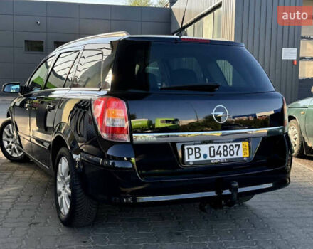 Черный Опель Астра, объемом двигателя 1.6 л и пробегом 197 тыс. км за 5700 $, фото 2 на Automoto.ua