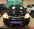 Черный Опель Астра, объемом двигателя 1.4 л и пробегом 210 тыс. км за 5600 $, фото 1 на Automoto.ua