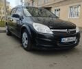 Черный Опель Астра, объемом двигателя 1.7 л и пробегом 330 тыс. км за 4700 $, фото 1 на Automoto.ua