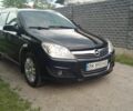 Черный Опель Астра, объемом двигателя 1.7 л и пробегом 230 тыс. км за 4300 $, фото 1 на Automoto.ua