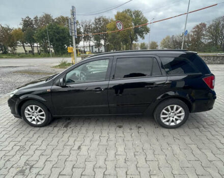 Черный Опель Астра, объемом двигателя 1.6 л и пробегом 281 тыс. км за 5200 $, фото 2 на Automoto.ua