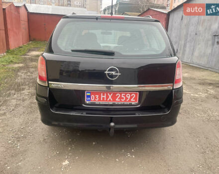 Черный Опель Астра, объемом двигателя 1.6 л и пробегом 206 тыс. км за 4900 $, фото 2 на Automoto.ua