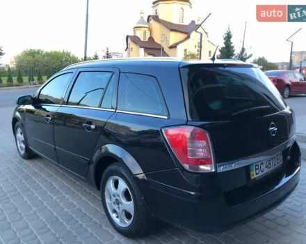 Черный Опель Астра, объемом двигателя 1.7 л и пробегом 253 тыс. км за 3950 $, фото 5 на Automoto.ua