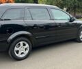 Черный Опель Астра, объемом двигателя 1.6 л и пробегом 181 тыс. км за 5700 $, фото 4 на Automoto.ua