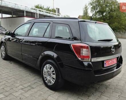 Черный Опель Астра, объемом двигателя 1.6 л и пробегом 209 тыс. км за 5850 $, фото 27 на Automoto.ua