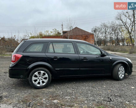 Черный Опель Астра, объемом двигателя 1.8 л и пробегом 209 тыс. км за 5600 $, фото 1 на Automoto.ua