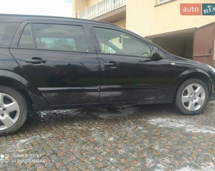 Черный Опель Астра, объемом двигателя 1.6 л и пробегом 200 тыс. км за 6000 $, фото 1 на Automoto.ua