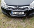 Черный Опель Астра, объемом двигателя 1.9 л и пробегом 320 тыс. км за 5600 $, фото 2 на Automoto.ua