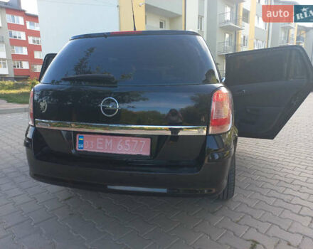 Черный Опель Астра, объемом двигателя 1.6 л и пробегом 260 тыс. км за 6000 $, фото 10 на Automoto.ua
