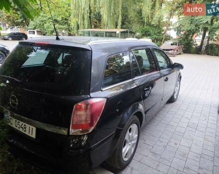 Черный Опель Астра, объемом двигателя 1.6 л и пробегом 250 тыс. км за 5200 $, фото 4 на Automoto.ua