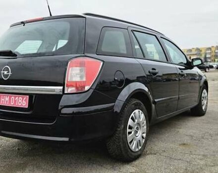 Черный Опель Астра, объемом двигателя 1.6 л и пробегом 210 тыс. км за 5850 $, фото 18 на Automoto.ua