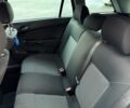 Черный Опель Астра, объемом двигателя 1.8 л и пробегом 225 тыс. км за 5800 $, фото 15 на Automoto.ua
