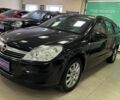 Черный Опель Астра, объемом двигателя 1.4 л и пробегом 210 тыс. км за 5600 $, фото 2 на Automoto.ua