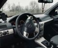 Черный Опель Астра, объемом двигателя 1.9 л и пробегом 262 тыс. км за 5500 $, фото 6 на Automoto.ua