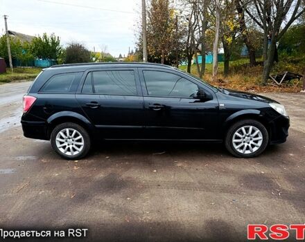 Черный Опель Астра, объемом двигателя 1.7 л и пробегом 300 тыс. км за 5250 $, фото 6 на Automoto.ua