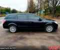 Черный Опель Астра, объемом двигателя 1.7 л и пробегом 300 тыс. км за 5250 $, фото 6 на Automoto.ua