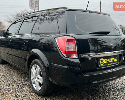 Черный Опель Астра, объемом двигателя 1.6 л и пробегом 260 тыс. км за 6200 $, фото 4 на Automoto.ua